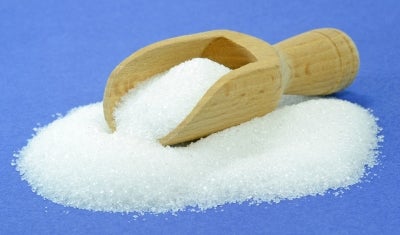 pile of sugar on a blue background