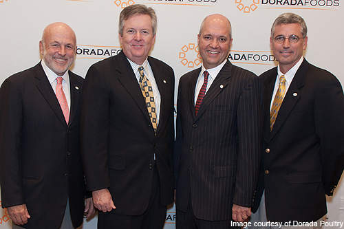 Ed Sanchez, Chairman and CEO and Jim English, President and COO of Dorada Poultry with John Tyson, Chairman and Donnie Smith, President and CEO of Tyson Foods during the opening of the Ponca City facility.