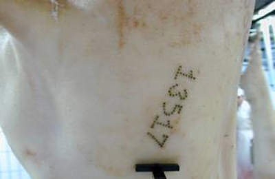 A ham tattoo which is a fail safe in addition to the smart card tracking system for carcasses.