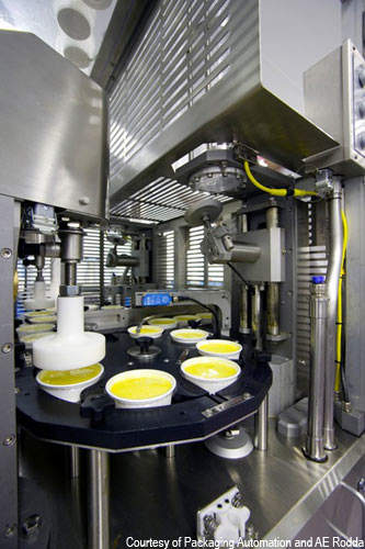 The Starwheel machine from Packaging Automation can apply lids at 100 pots per minute.