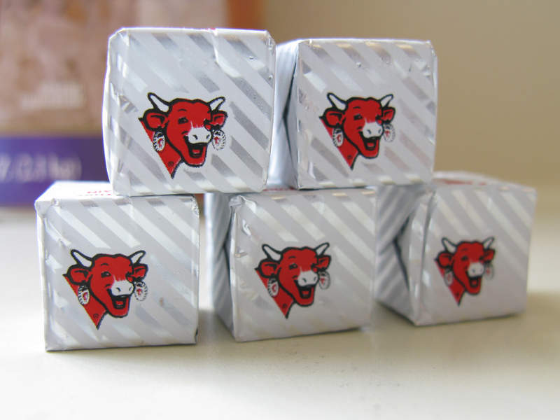 The Laughing Cow® was initially launched in an aluminium-wrapped packaging. Credit: Amayzun.